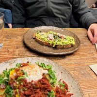 Bagel Seeds Avocado Toast (vegan)

*Breakfast Tostada in foreground at Honest Greens - Plaça Catalunya in Barcelona