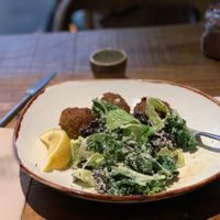 Vegan Kale Cesar with falafel  at Honest Greens - Plaça Catalunya in Barcelona