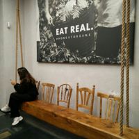 Cool huge swing at Honest Greens - Plaça Catalunya in Barcelona