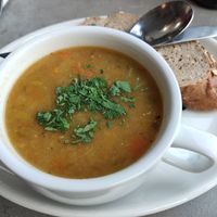 Chunky vegetable soup, served with bread and vegan butter at The Bluebird Café by the Lake in Coniston