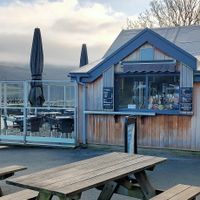 Outside (with swan sitting at entrance :)) at The Bluebird Café by the Lake in Coniston