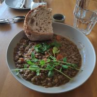 Lentil goulash with sourdough bread at Szünet in Pecs
