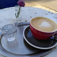 Cappuccino with Oatmilk - They always serve some water with the coffee! at Fräulein Coffea in Bochum