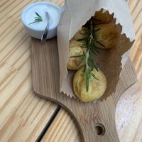 Entrada de pão do amor com requeijão  at Purana in Sao Paulo