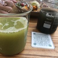 Green awakening juice and activated charcoal juice   at Purana in Sao Paulo