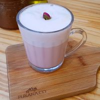 Bebida com rosas e leite vegetal at Purana in Sao Paulo