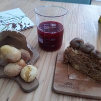 Pãezinhos do amor, torta de maçã e suco da terra. at Purana in Sao Paulo