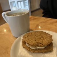 Coffee & delicious oatmeal cream pie  at Little Owl Cafe in Fairbanks