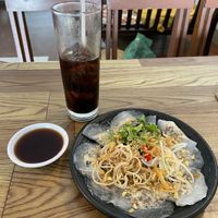 Seaweed and tofu dumplings with their iced coffee  at Chay Corner in Da Nang