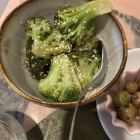 Broccoli with sesame seeds— this was delicious and perfectly cooked.   at Stressfree in Vila Nova De Milfontes