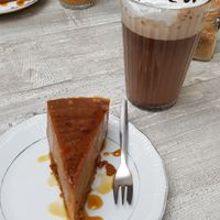Salted caramel "cheese" cake & hot chocolate w/ coconut milk at Pluk Cats & Coffee in Maastricht
