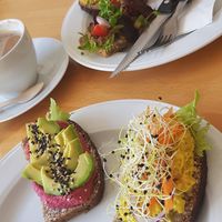 Left: beetroot hummus + avocado; Right: Chickpea salad + pickled carrots, both served on a type of whole wheat bread at Lillians Smørrebrød in Copenhagen