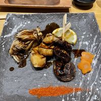 Grilled mushrooms, with tare. at Tane Vegan Izakaya in Honolulu