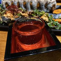 Over-poured sake. Scrumptious flavor with gorgeous presentation  at Tane Vegan Izakaya in Honolulu