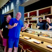 Happpppy customers with owner and chef  at Tane Vegan Izakaya in Honolulu