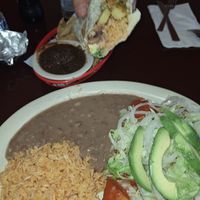 Had the potato enchiladas with red sauce,my husband had a bean rice, & potato burrito. Ask for their vegan menu, lots of choices! They were both really good. The chips/salsa was  at El Charrito Market in Gilroy