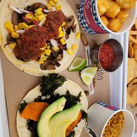Mushroom taco, sweet potato taco, tator tots and vegan rice at OSO Paseo in Oklahoma City