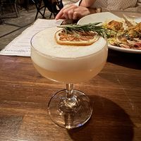 Botanique - Zero Proof Cocktail. Lemony and rosemary flavor with a fun foam topping.  at Millennium in Oakland