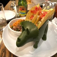 Kids tacos arrive in a dinosaur 🦖 🌮  at Bang Bang Kitchen in Seattle