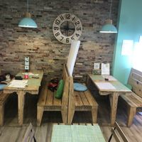 Lovely cosy diner seating  at Izzy's Market Vegetarian Boutique in Vila Do Bispo