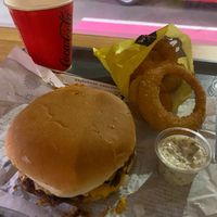 Smash burger & onion rings.  at Junkyard in Reykjavik