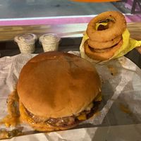 Smash burger & onion rings.  at Junkyard in Reykjavik