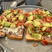 Vegan mollete - toast with avocado, refried beans, pico de gallo and vegan cheese.   at Yah-Yah in Sayulita