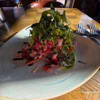 Bruschetta (vegan), mostly a pile of chopped tomatoes and onions with a tiny piece of bread. at Garvie & Co in Milngavie