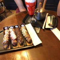 Strawberry milkshake and Spanish churros with ice cream (so creamy!!)  at The Boinas in Sao Paulo