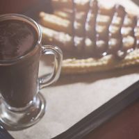 Creamy drink made with chocolate and a mix of almond and hazelnut milks, served with The Boinatella syrup (hazelnut cream). at The Boinas in Sao Paulo