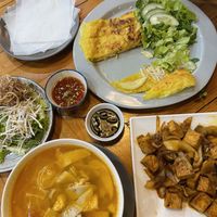 Vietnamese pancakes, mushroom tofu stew, and tofu & tomato noodles (watch out for the orange chillies 🥵)  at ROM Vegetarian Restaurant in Hoi An