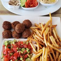 Falafel plate (comes on 3 plates; pita missing from photo). at Falafel Bocas Sababa in Bocas Del Toro
