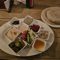 Hummus, pita, sides and sauces with Falafel plate at Falafel Bocas Sababa in Bocas Del Toro