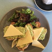 Sourdough toast w/ avo and vegan cheese at Sustain Cafe in Lawson