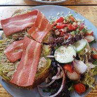Sandwich with avocado and baba ganoush, tabouleh salad, and vegan bacon. at Preps in Maastricht