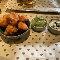 Cauliflower wings (with vegan sourcream and additional guacamole)  at Burgerheart in Wurzburg