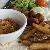 Falafel, fries, and hummus wrap with salad!  at By the Sea Restaurant in Sihanoukville
