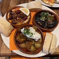 Patatas Bravad (my favourite, I recommend trying them), Hummus (very good) and Garlic Mushrooms (they were descend)  at The Square Orange in Keswick