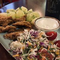 Breaded oyster mushroom with dill potatoes, salad, and chili mayo   at no bones in Krakow