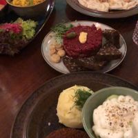 Carpaccio, polish style minced cutlet with potatoes, pierogi and no feathers "chicken" at no bones in Krakow