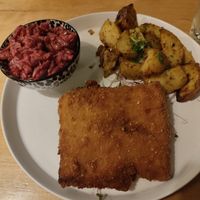 Schabowy cutlet, potatoes and fried beetroot at no bones in Krakow