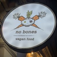Sign in front of the entrance at no bones in Krakow