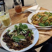 Black bean pad thai, mango pad thai, mango lasso, comboocha at Tajfun in Wroclaw