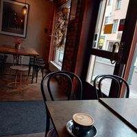 A chocolate ball with a Cappuccino on oat at Simon's in Linkoping