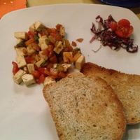 diced tofu with toast at The Beehive Hostel in Rome