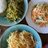 Fried noodles, papaya salad and cha kadao  at Robinson Bungalows in Sihanoukville