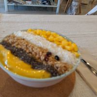 Mango smoothie bowl at Le Cattitude Cafe in Vientiane