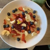 Creamy Porridge with Oat milk and Berrys + Green Smoothie with Oat Milk. Also had a nice Matcha Latte   at Detour Café in West London