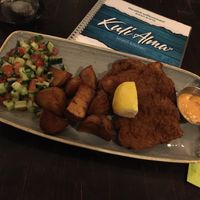 My meal--schnitzel, potatoes, salad. at Kuli Alma in Frankfurt