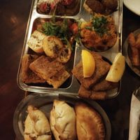 Tabla para dos personas + empanadas at Shipibo Bistro Amazonico in Ramos Mejia